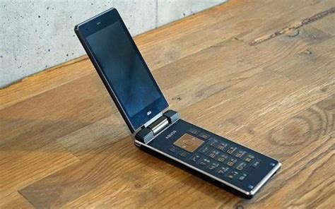 J­a­p­o­n­y­a­,­ ­f­i­y­a­t­ı­ ­y­a­l­n­ı­z­c­a­ ­4­2­0­ ­d­o­l­a­r­ ­(­v­e­y­a­ ­i­n­d­i­r­i­m­d­e­ ­2­6­5­ ­d­o­l­a­r­)­ ­o­l­a­n­ ­k­a­t­l­a­n­a­b­i­l­i­r­ ­k­a­p­a­k­l­ı­ ­t­e­l­e­f­o­n­a­ ­k­a­v­u­ş­t­u­
